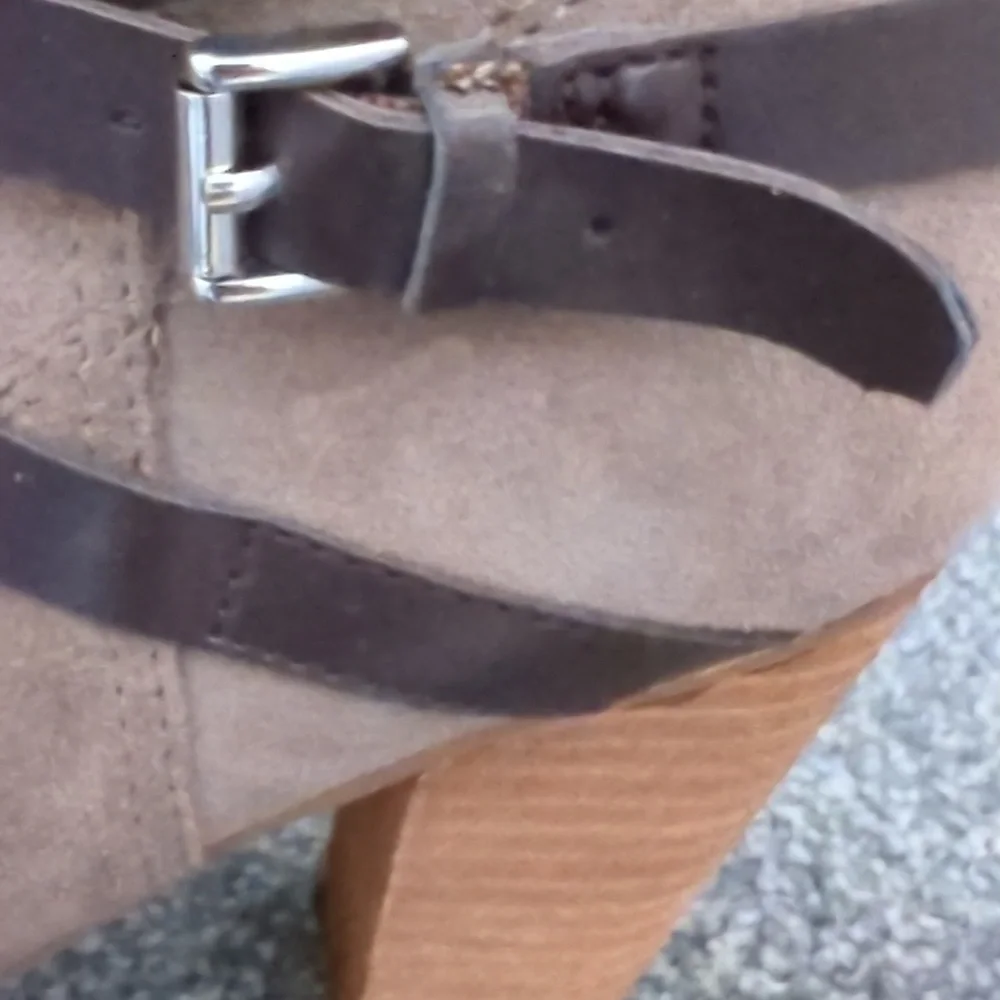 Ankle booties by Carlos Santana